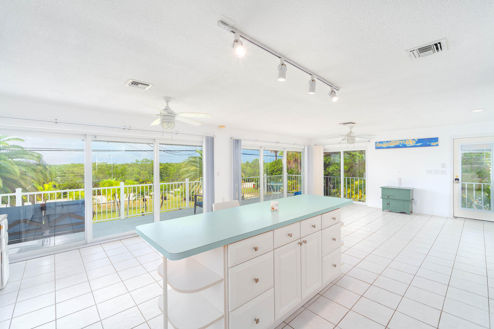 29849 Newfound Boulevard Big Pine Key, FL 33043 - Photo 11 of 25 a large white room with a large window