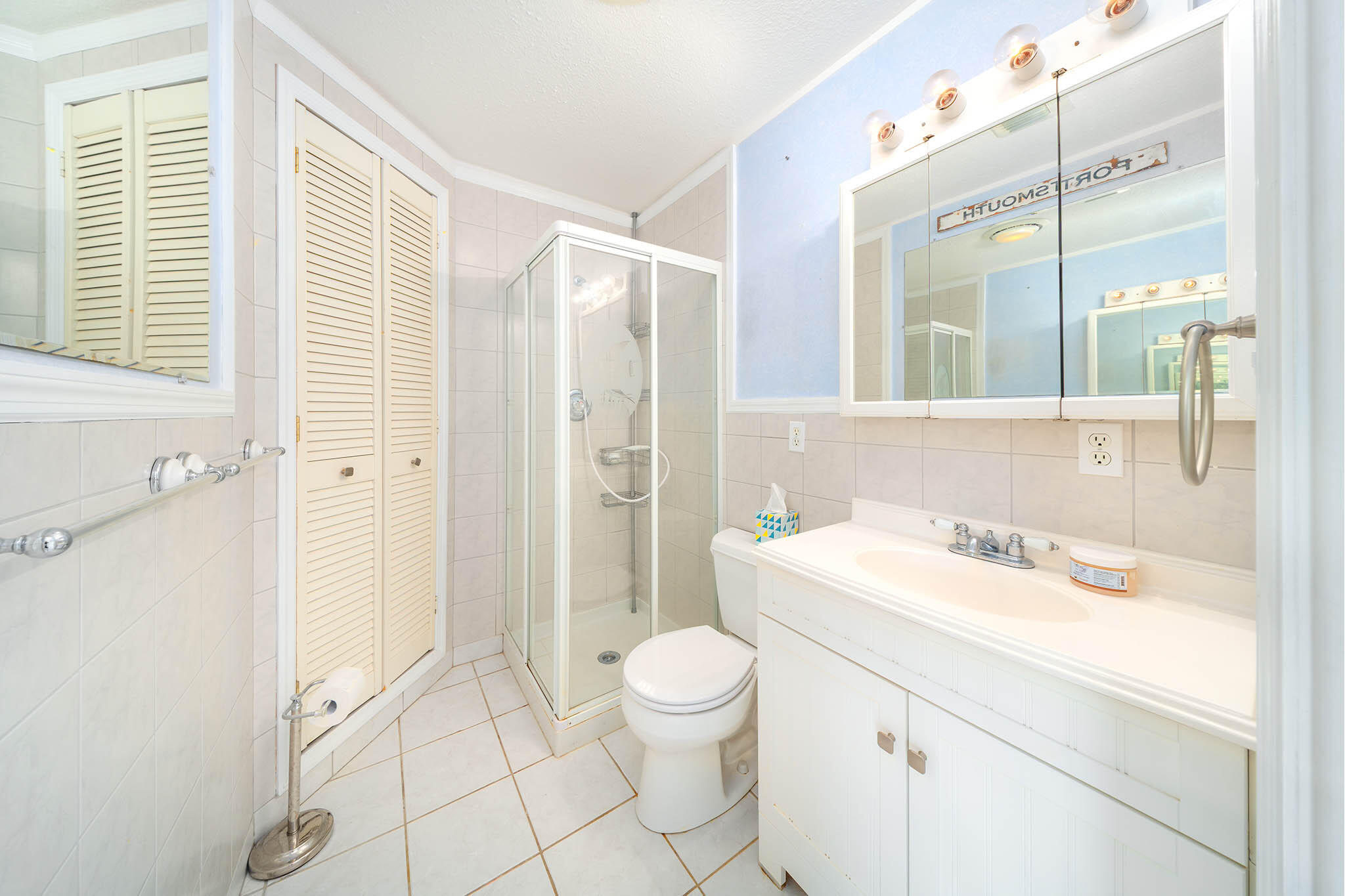 29849 Newfound Boulevard Big Pine Key, FL 33043 - Photo 17 of 25 a bathroom with a sink a toilet and shower