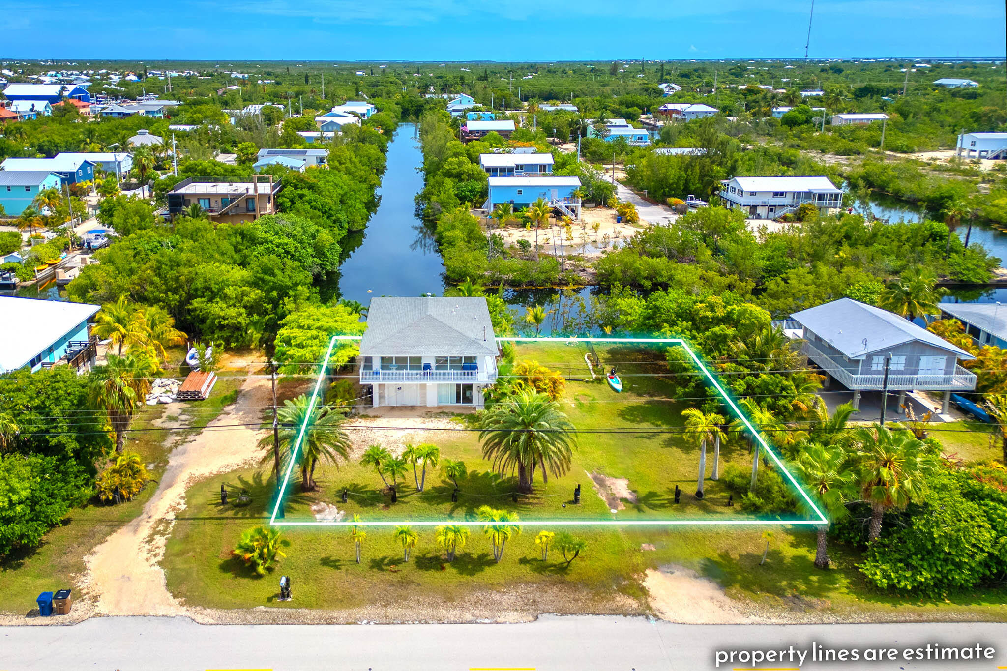 29849 Newfound Boulevard Big Pine Key, FL 33043 - Photo 2 of 25 an aerial view of residential houses with outdoor space and parking