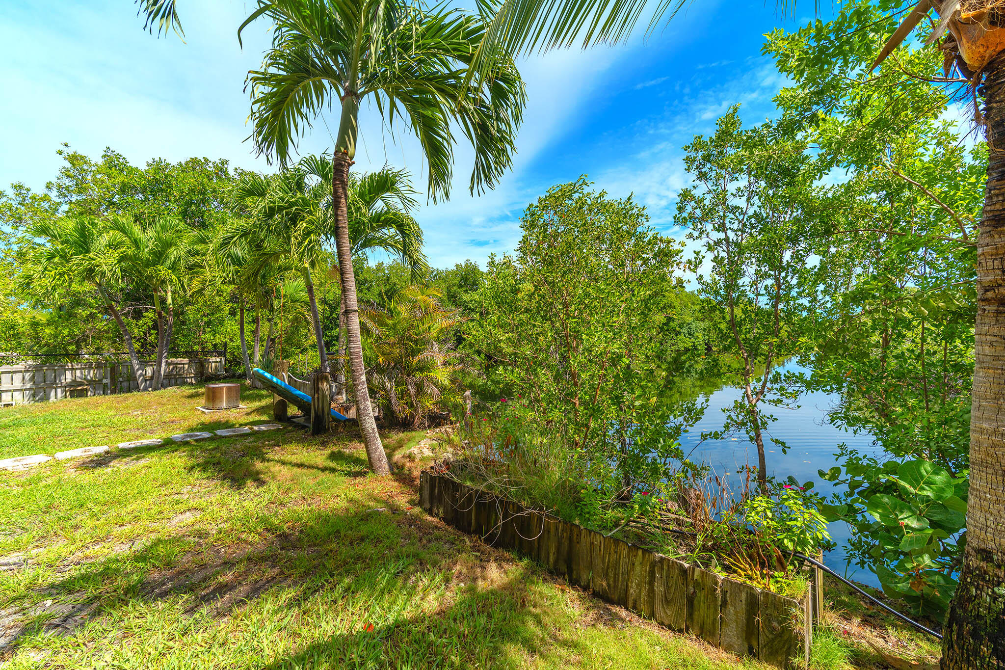29849 Newfound Boulevard Big Pine Key, FL 33043 - Photo 24 of 25 a view of a yard with an outdoor space