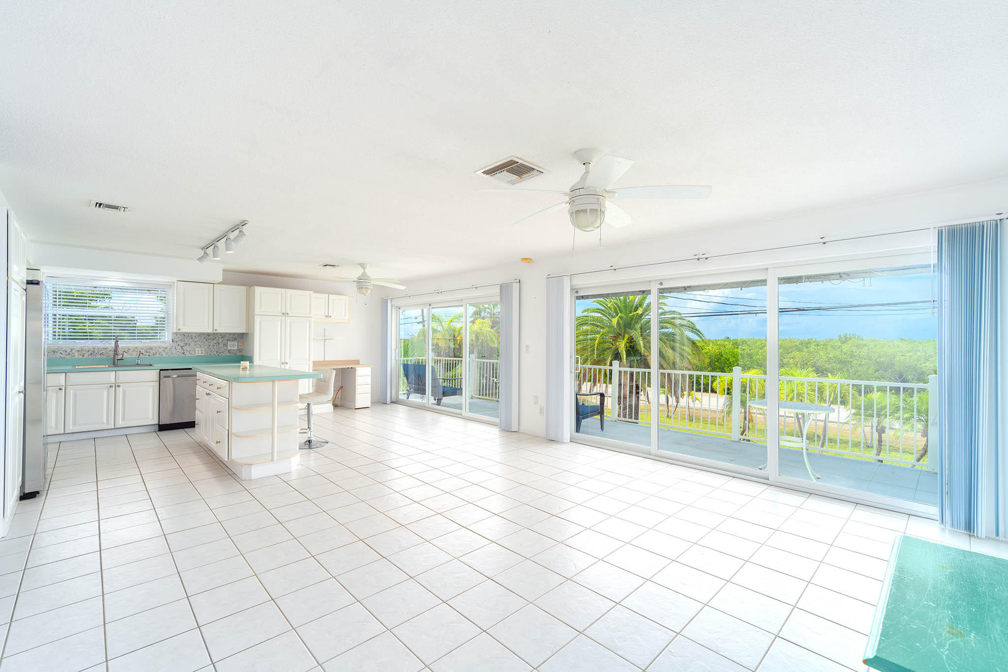 29849 Newfound Boulevard Big Pine Key, FL 33043 - Photo 7 of 25 a view of a living room and a large window