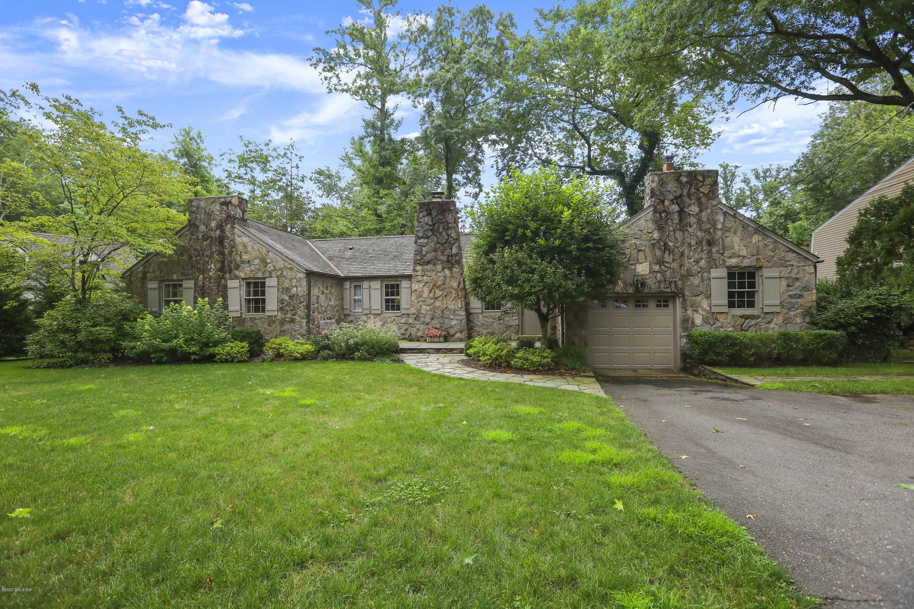 14 Hidden Brook Road Riverside, CT 06878 - Photo 1 of 13 a view of a house with backyard and garden