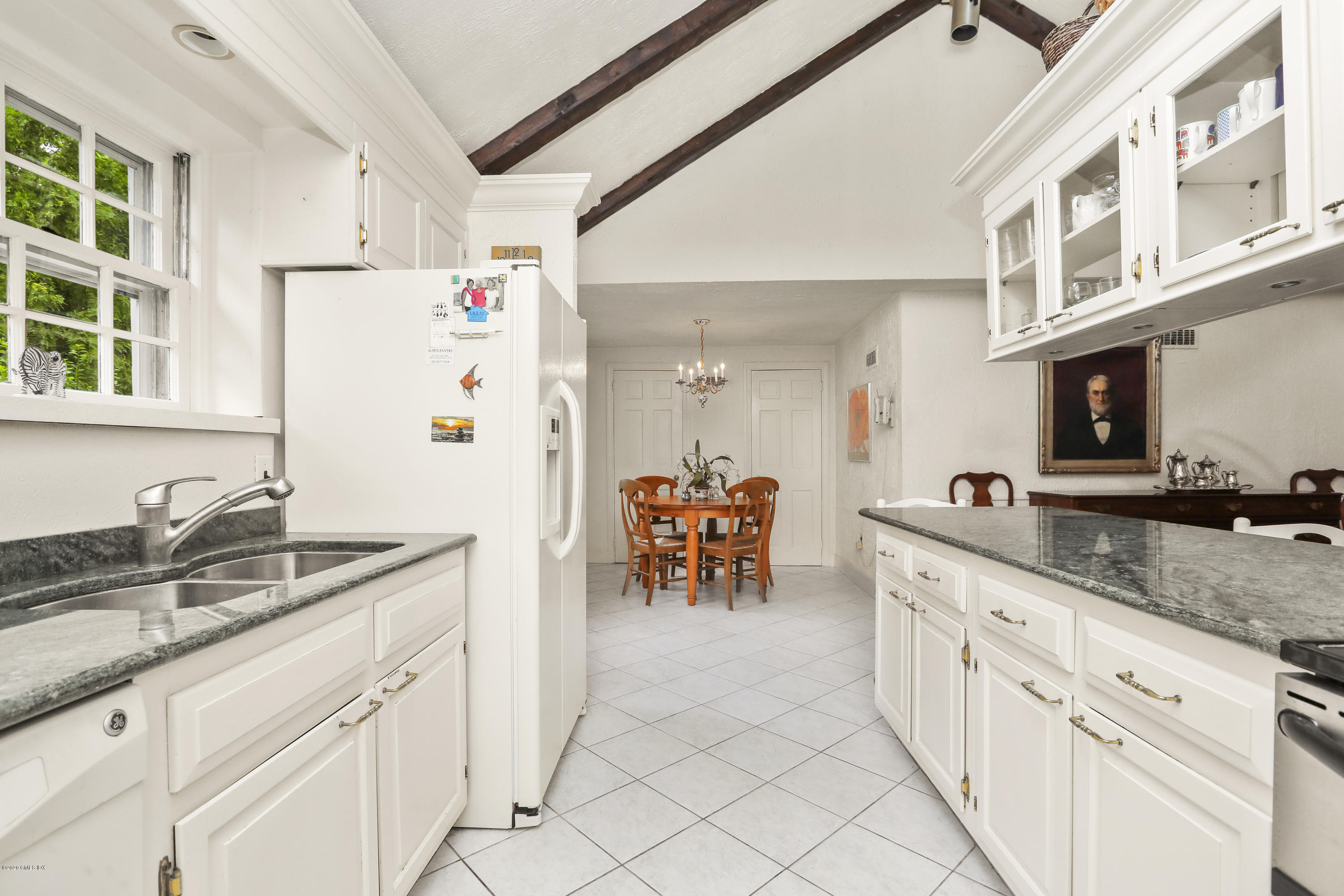 14 Hidden Brook Road Riverside, CT 06878 - Photo 10 of 13 a kitchen with a sink and cabinets