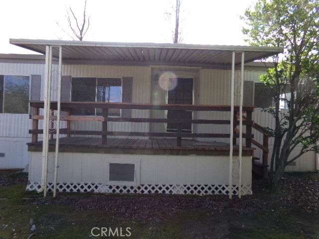 323 Ridgecrest Parkway Oroville, CA 95966 - Photo 5 of 35 a front view of a house with garage