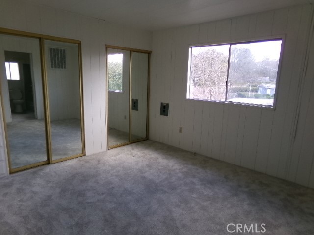 323 Ridgecrest Parkway Oroville, CA 95966 - Photo 7 of 35 an empty room with large windows
