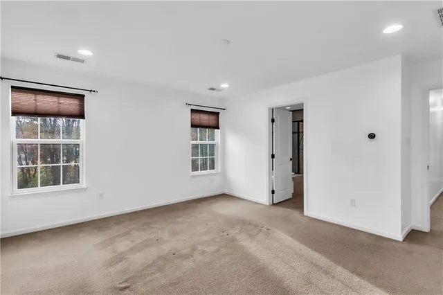 an empty room with windows