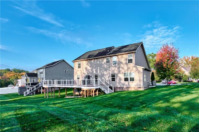 a view of a house with a big yard
