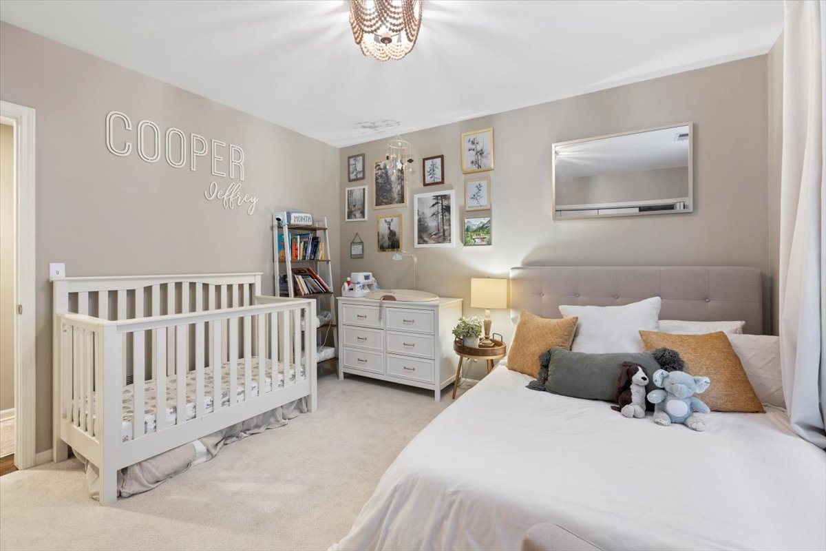 1132 West Wolfram Street, Unit 3 Chicago, IL 60657 - Photo 16 of 26 a bedroom with bed and a window