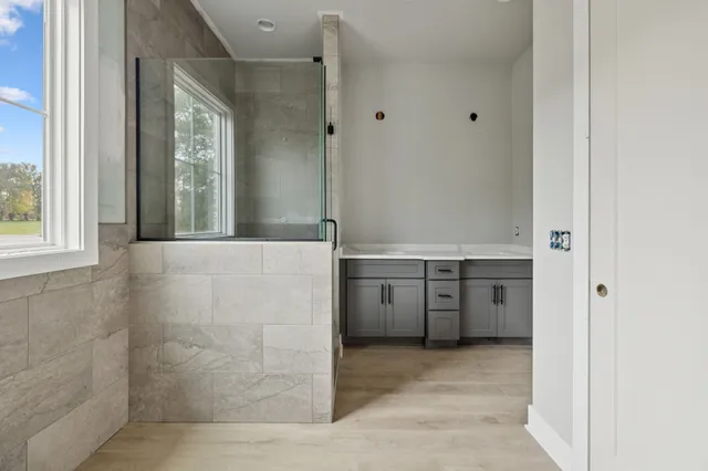 a bathroom with a sink and a mirror