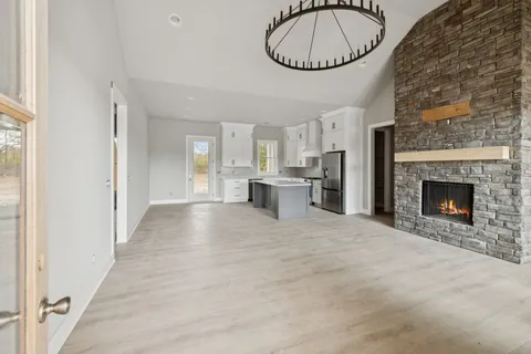 a view of a livingroom with a fireplace