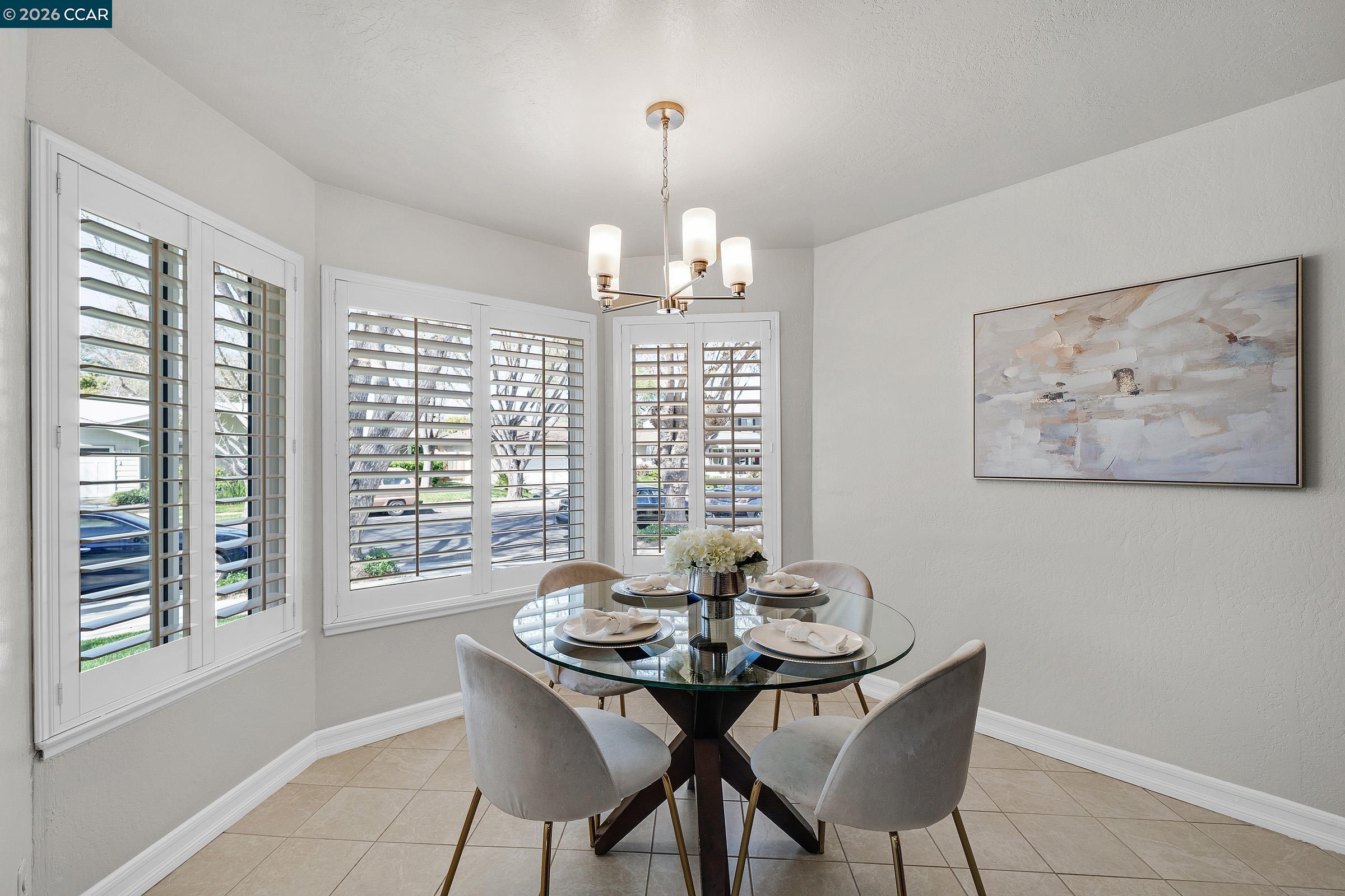 2415 Crestline Road Pleasanton, CA 94566 - Photo 12 of 40 a view of a dining room with furniture window and outside view