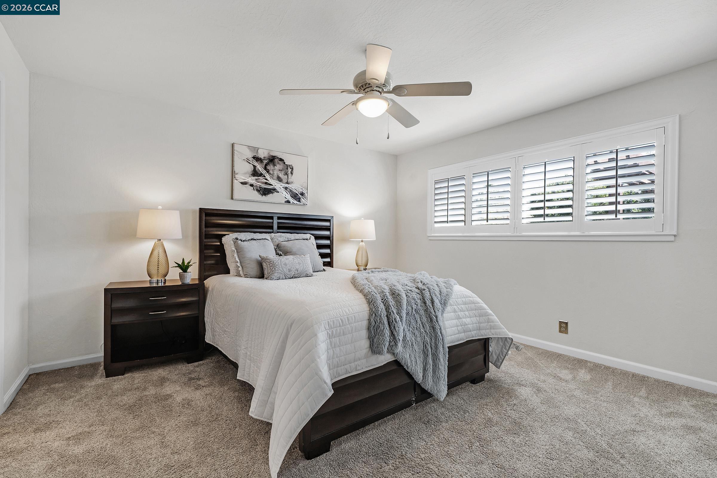 2415 Crestline Road Pleasanton, CA 94566 - Photo 15 of 40 a bedroom with a bed and window