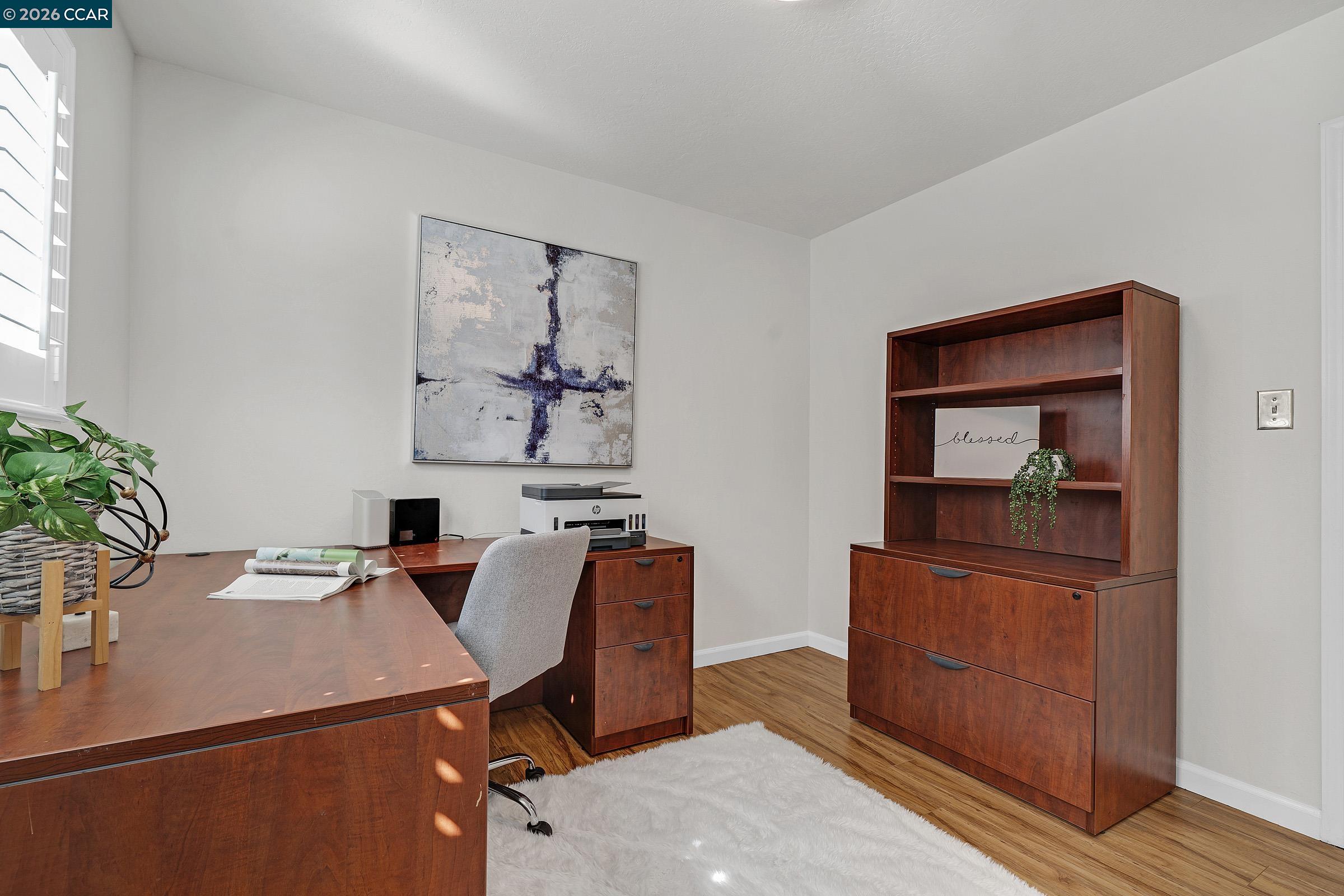 2415 Crestline Road Pleasanton, CA 94566 - Photo 19 of 40 a view of a workspace with furniture