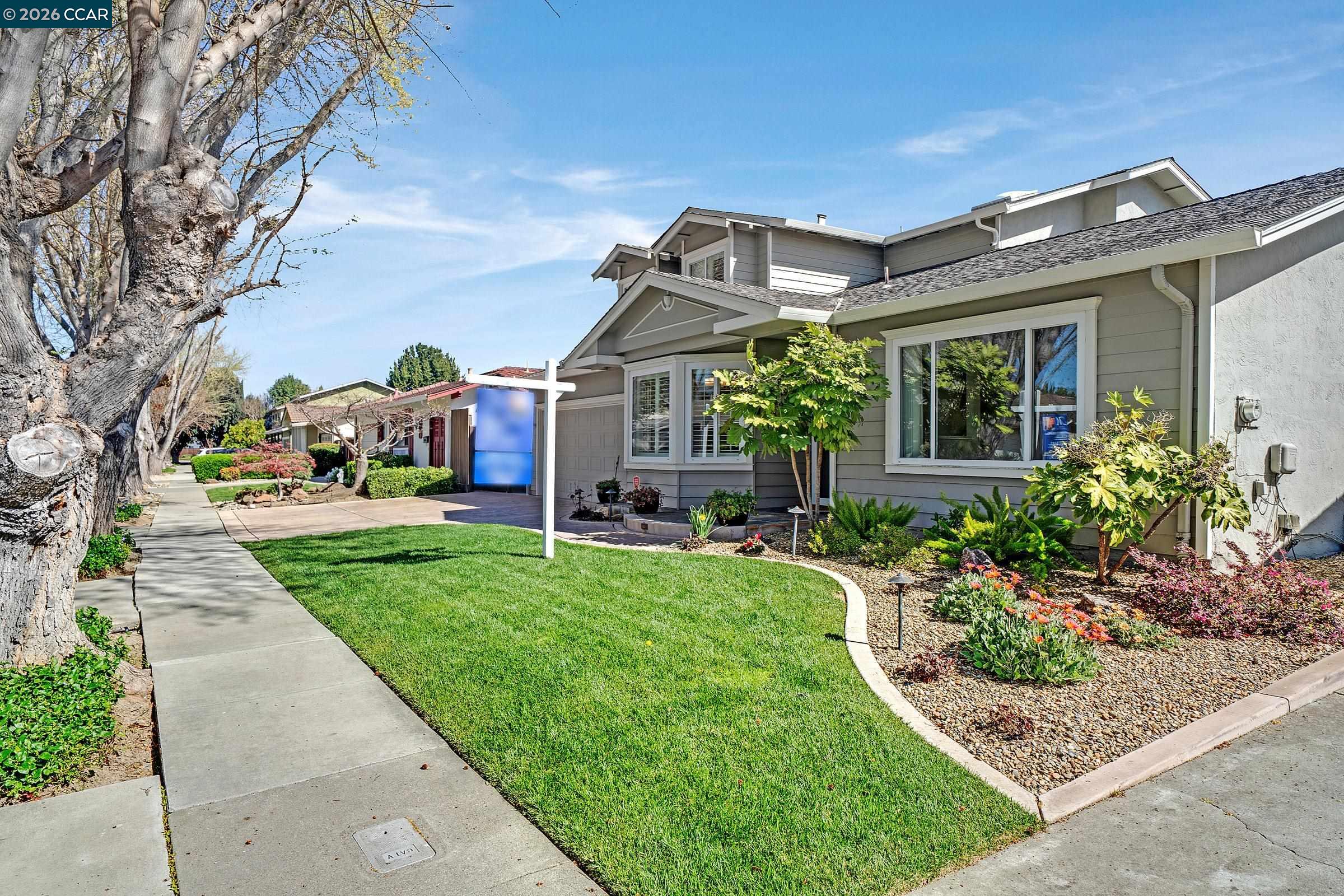 2415 Crestline Road Pleasanton, CA 94566 - Photo 2 of 40 a front view of a house with garden