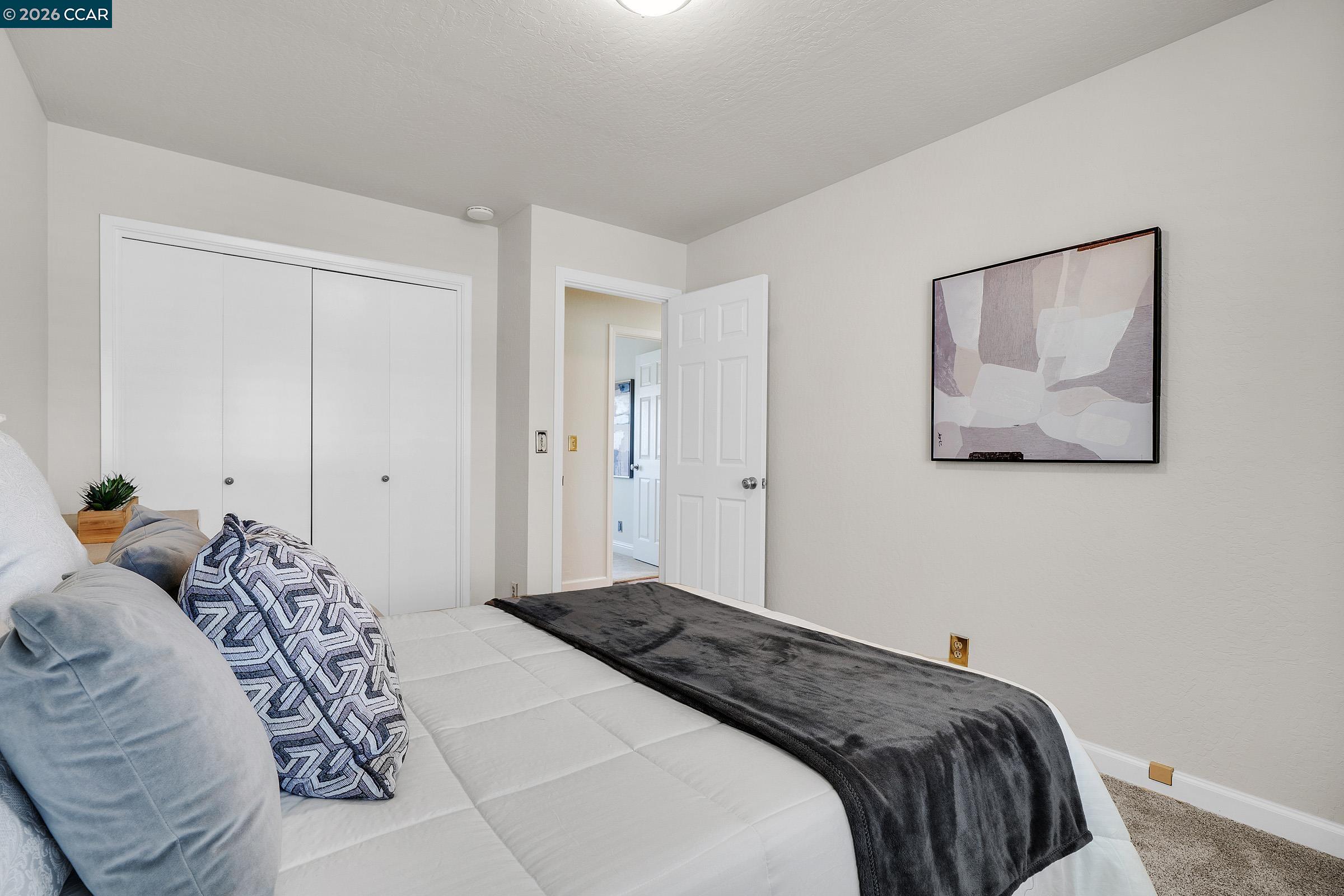 2415 Crestline Road Pleasanton, CA 94566 - Photo 30 of 40 a bedroom with a bed and hallway