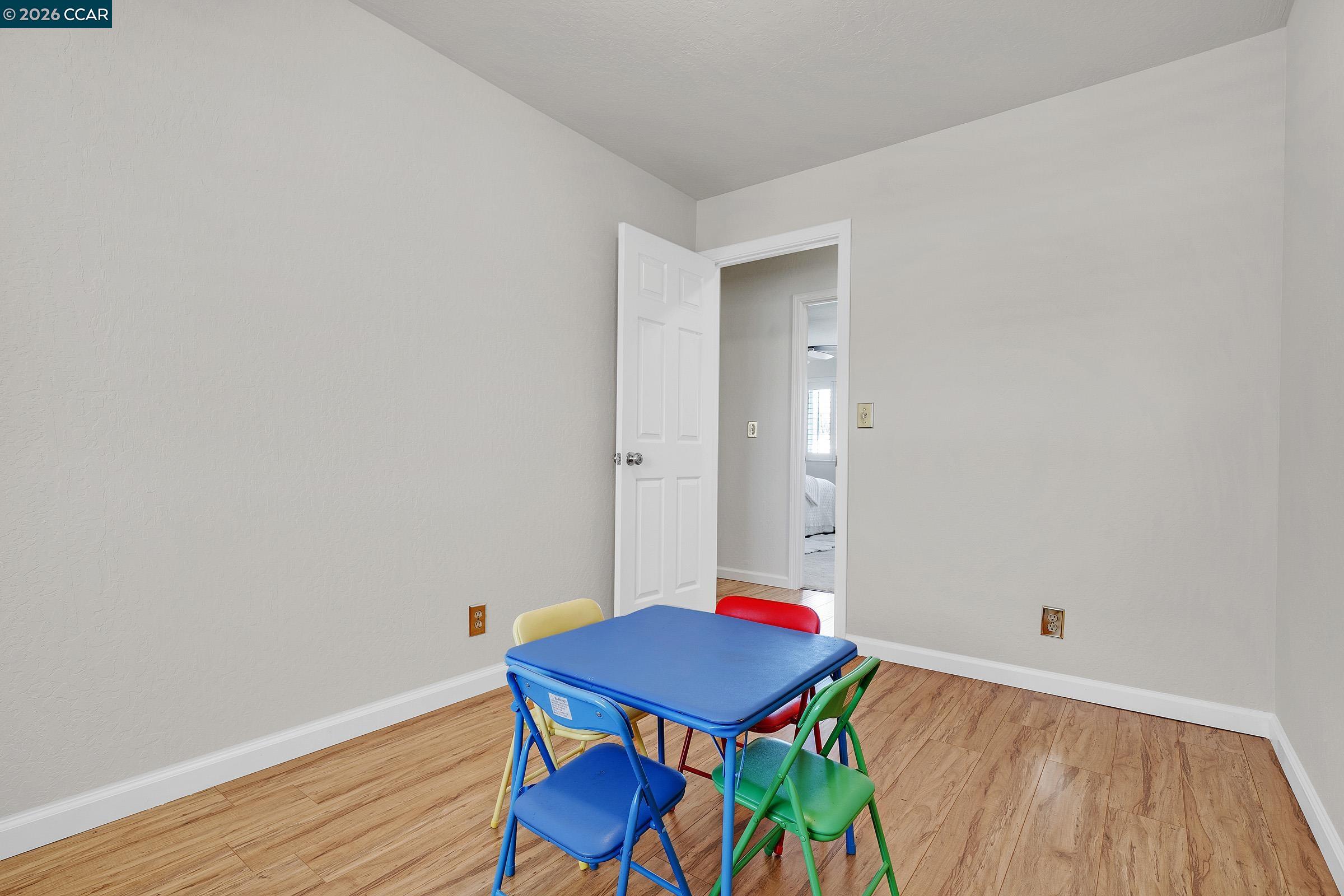 2415 Crestline Road Pleasanton, CA 94566 - Photo 31 of 40 a view of a room with furniture and wooden floor