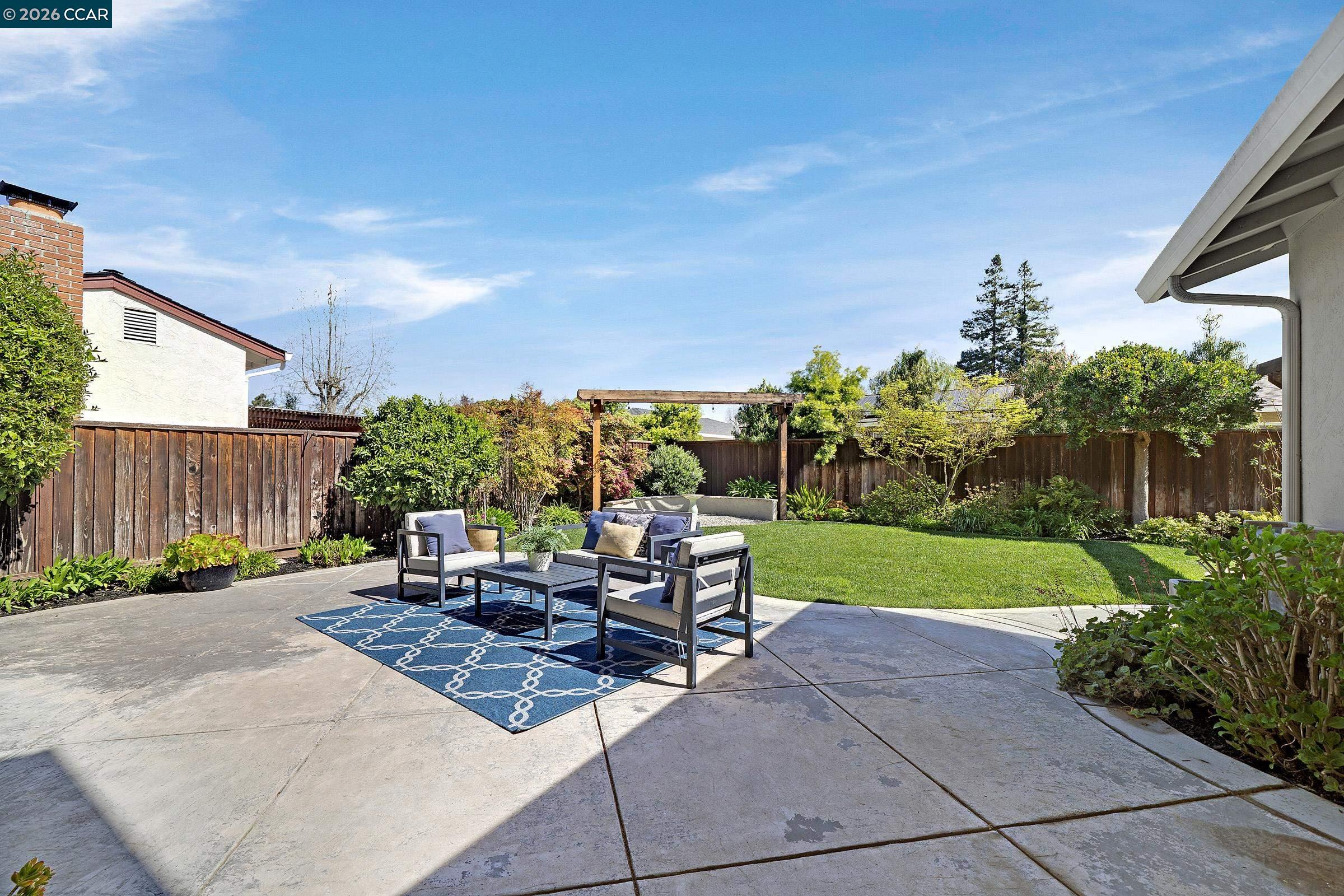 2415 Crestline Road Pleasanton, CA 94566 - Photo 35 of 40 a view of a backyard with sitting area