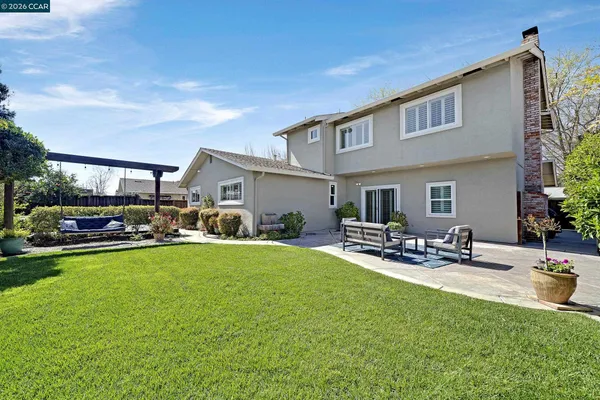 a view of a house with patio