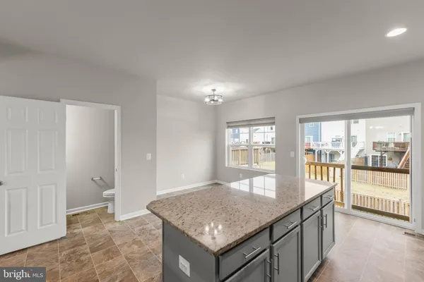 an empty room with large window