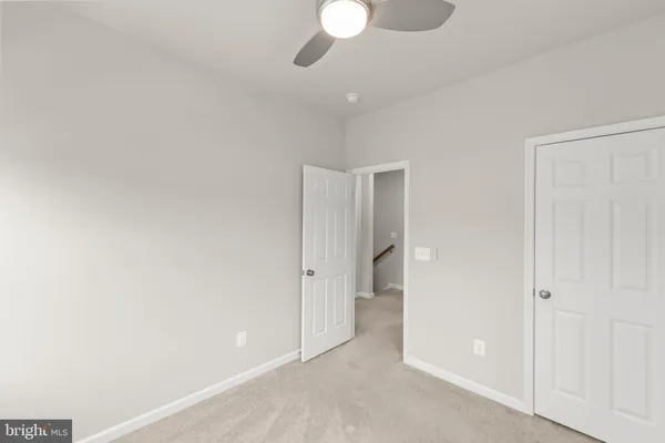 a view of a room with a bathroom