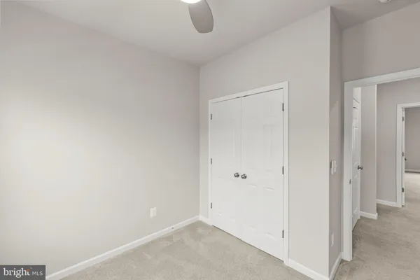 a view of walk in closet with window