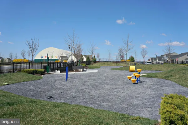 a view of a lake with a yard