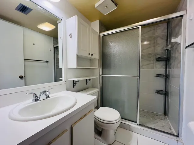 a view of a room with racks on the wall