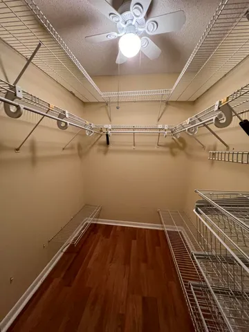 a view of a room with racks on the wall