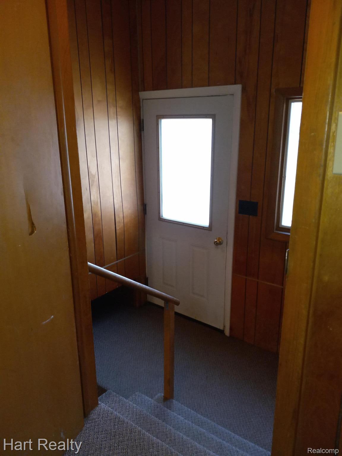 6105 Lynd Road Marlette, MI 48453 - Photo 38 of 45 Side door entrance and entrance to basement