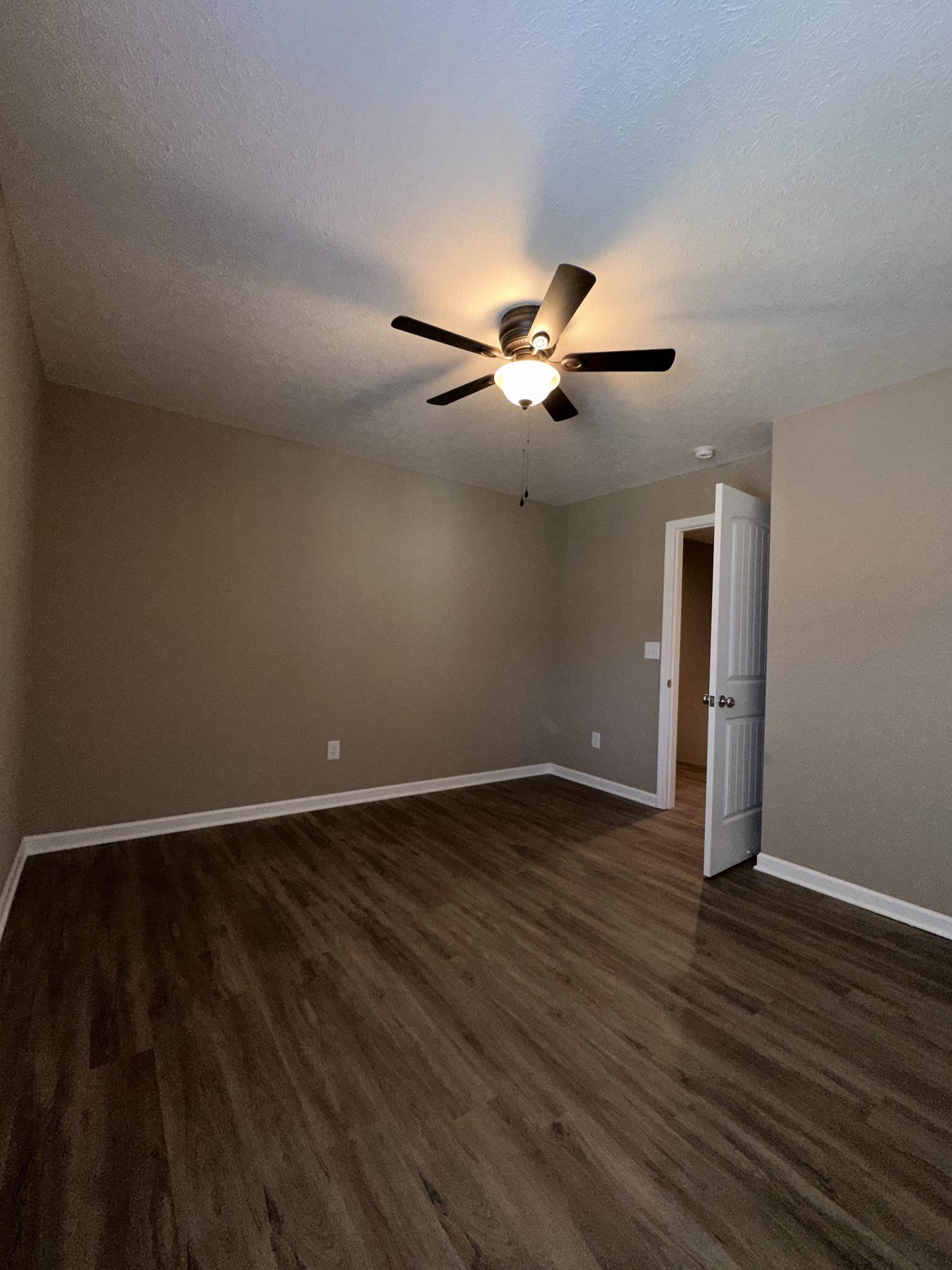 517 Weaver Street, Unit 4 Tullahoma, TN 37388 - Photo 15 of 22 a view of an empty room with wooden floor