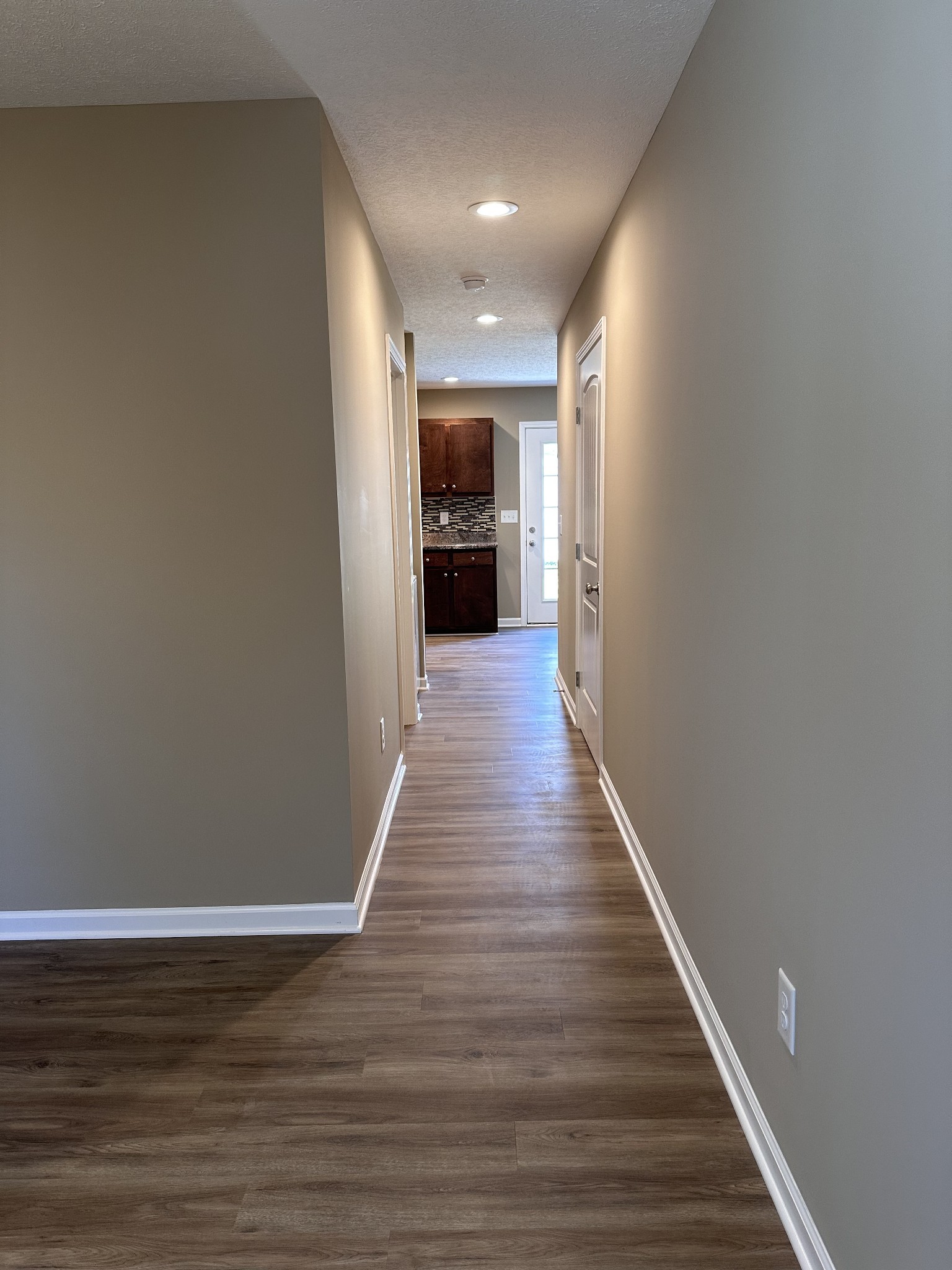 517 Weaver Street, Unit 4 Tullahoma, TN 37388 - Photo 4 of 22 a view of a hallway with wooden floor