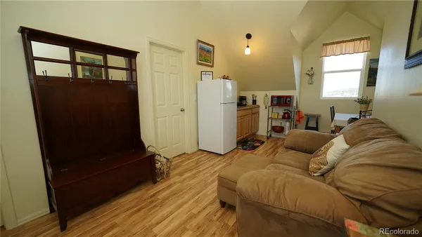 a bed room with a bed and a window