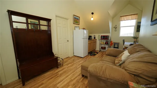 a bed room with a bed and a window