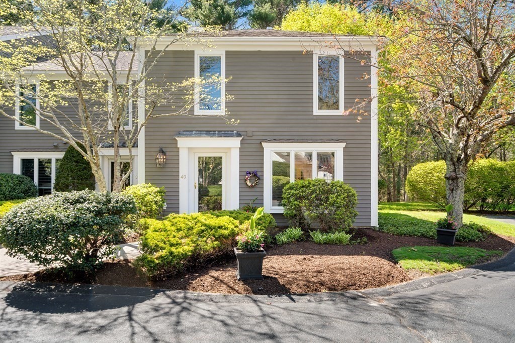 a view of a house with a garden