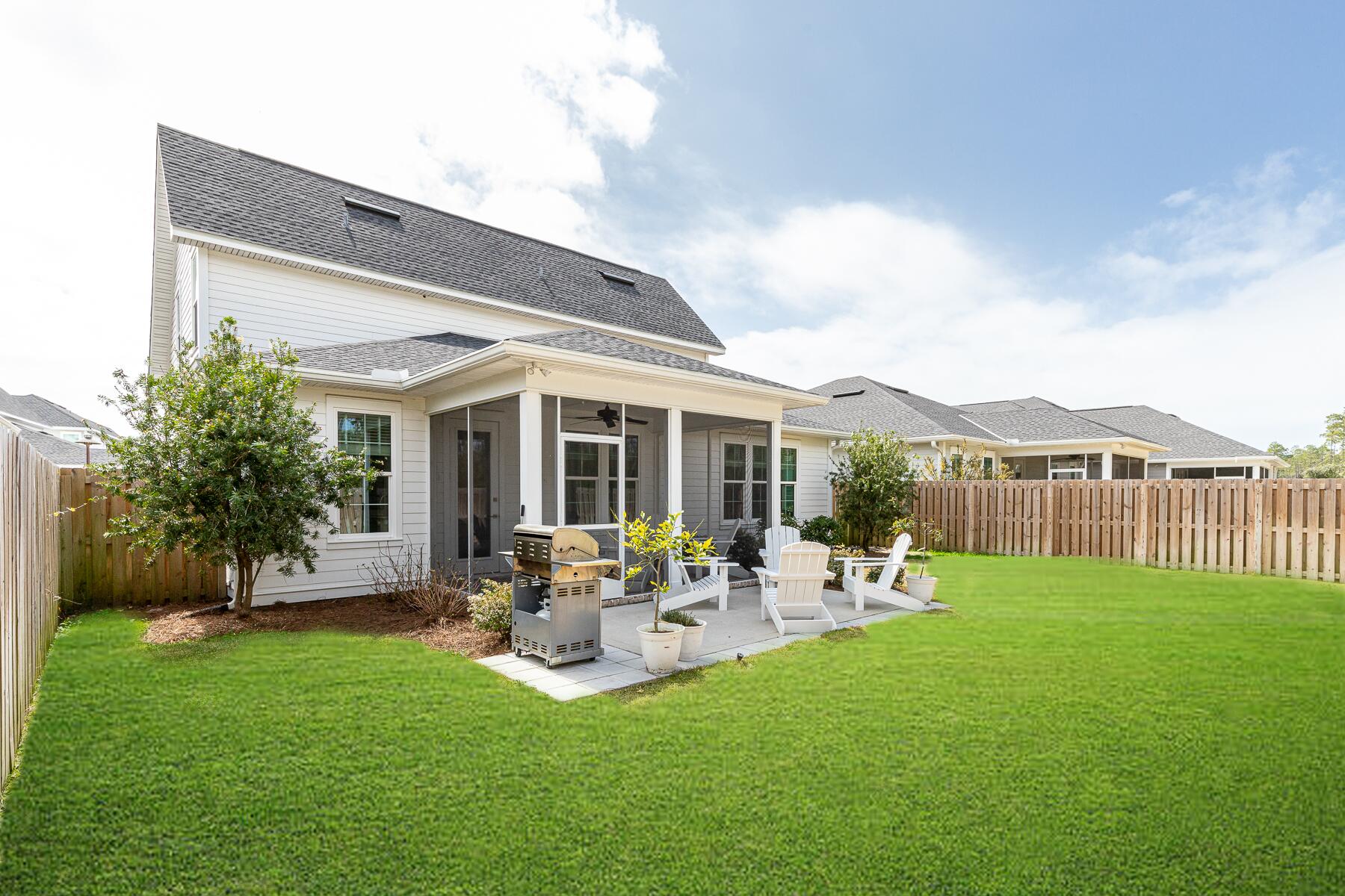129 Windrow Way Inlet Beach Inlet Beach, FL 32461 - Photo 11 of 26 a garden view with a seating space and garden view