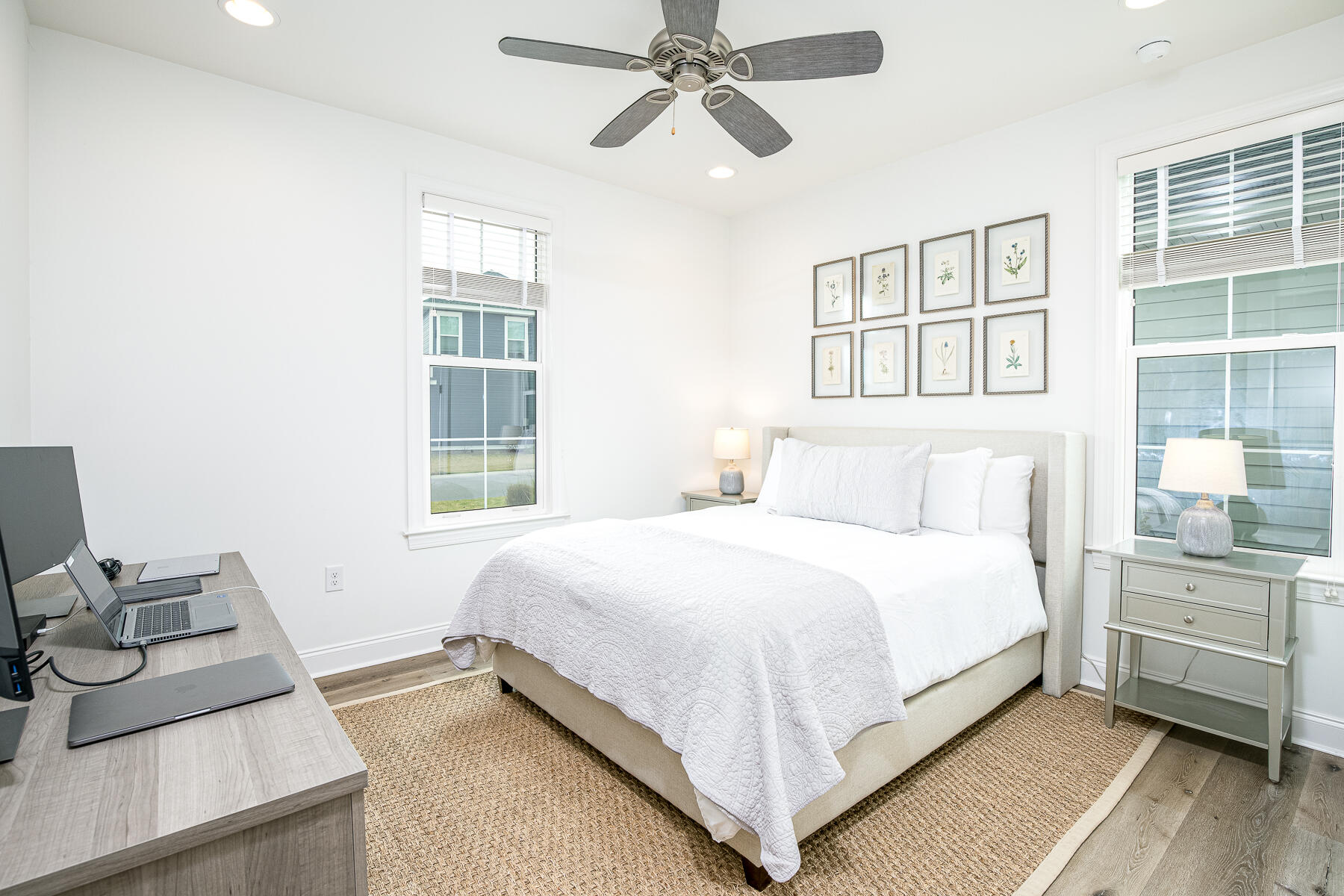 129 Windrow Way Inlet Beach Inlet Beach, FL 32461 - Photo 12 of 26 a bedroom with a bed and wooden floor