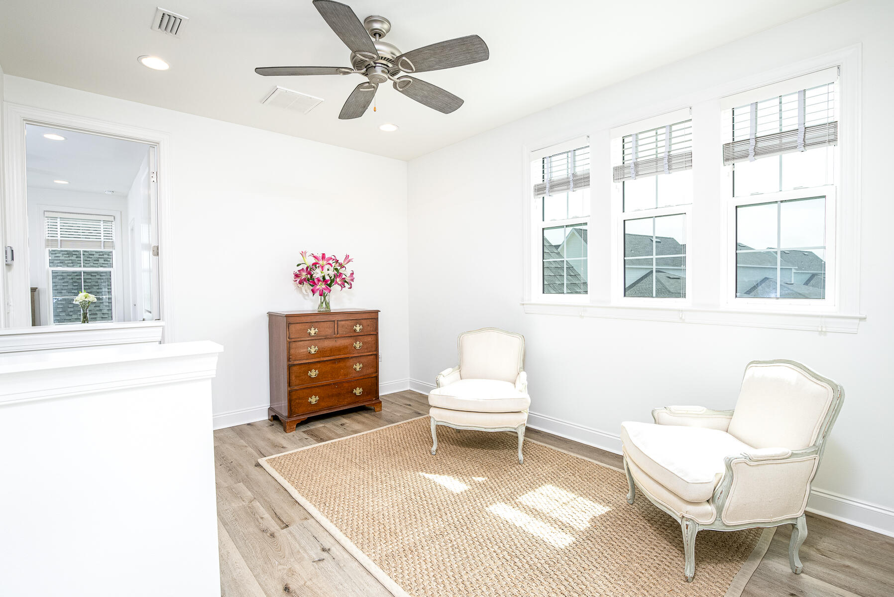 129 Windrow Way Inlet Beach Inlet Beach, FL 32461 - Photo 18 of 26 a living room with furniture a flat screen tv and a window