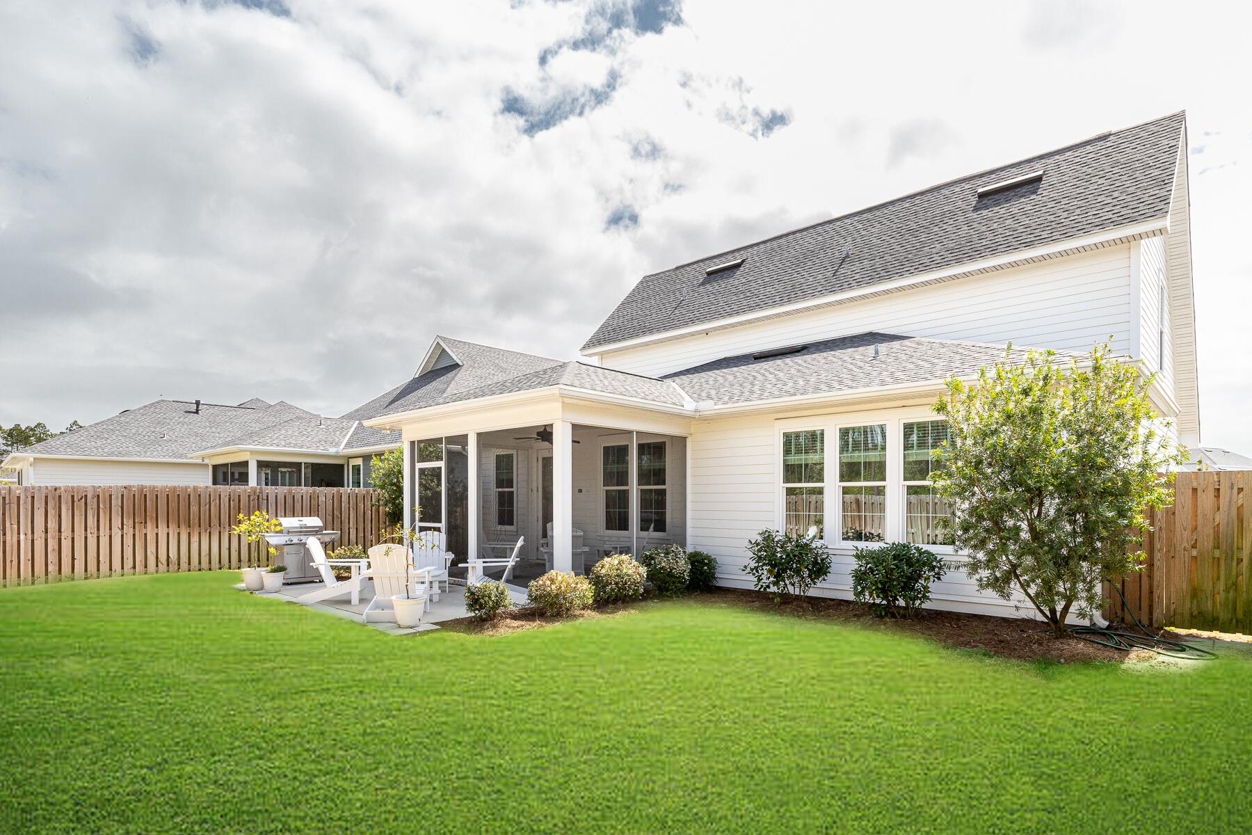 129 Windrow Way Inlet Beach Inlet Beach, FL 32461 - Photo 21 of 26 a front view of a house with garden and garden