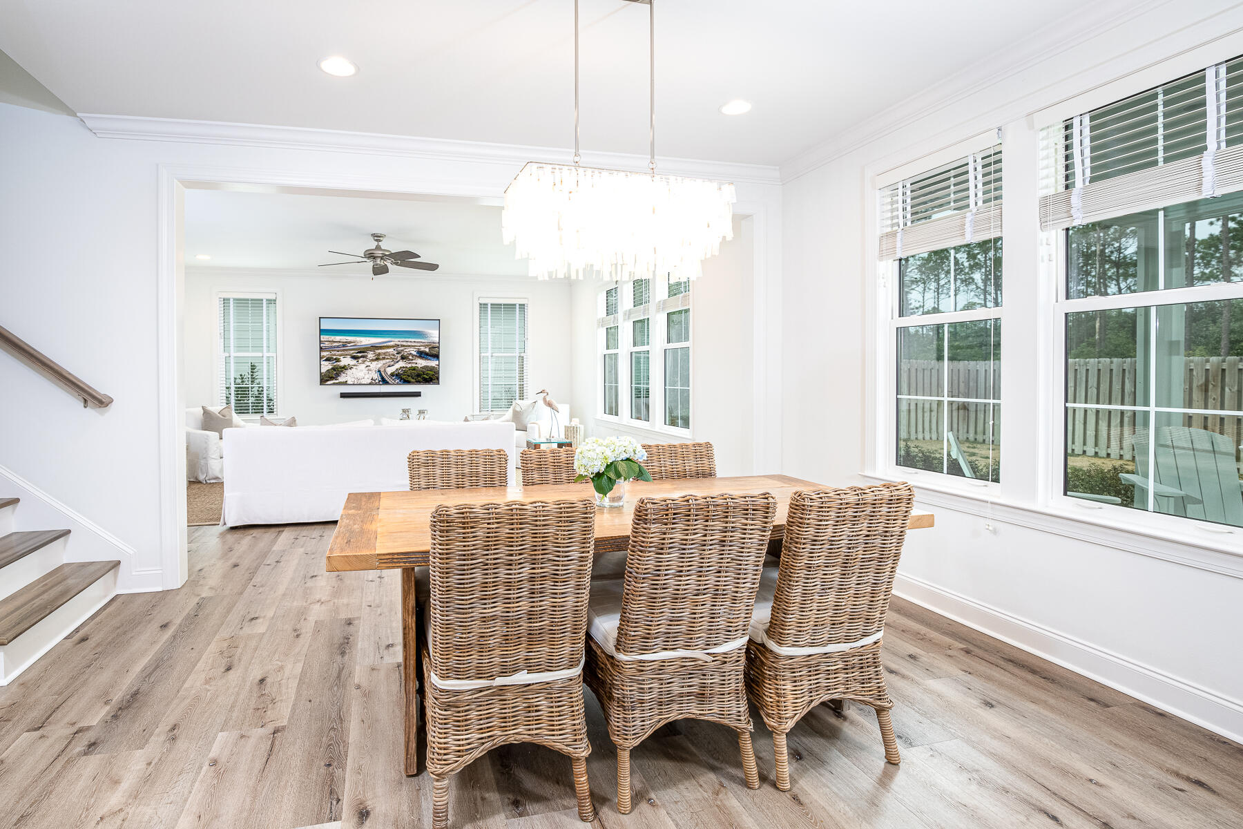 129 Windrow Way Inlet Beach Inlet Beach, FL 32461 - Photo 5 of 26 a view of a dining room with furniture wooden floor and chandelier