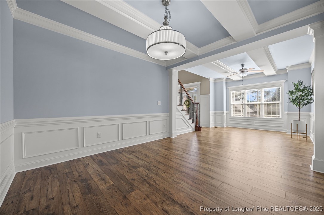2904 Hampton Ridge Road Fayetteville, NC 28311 - Photo 13 of 50 a view of an empty room with wooden floor and windows