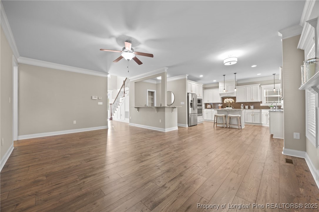2904 Hampton Ridge Road Fayetteville, NC 28311 - Photo 25 of 50 a view of a kitchen with wooden floor and a kitchen