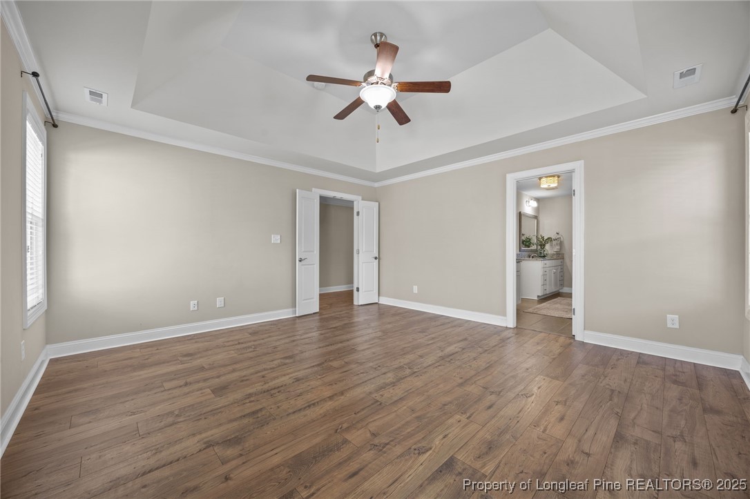 2904 Hampton Ridge Road Fayetteville, NC 28311 - Photo 29 of 50 wooden floor in an empty room with a window