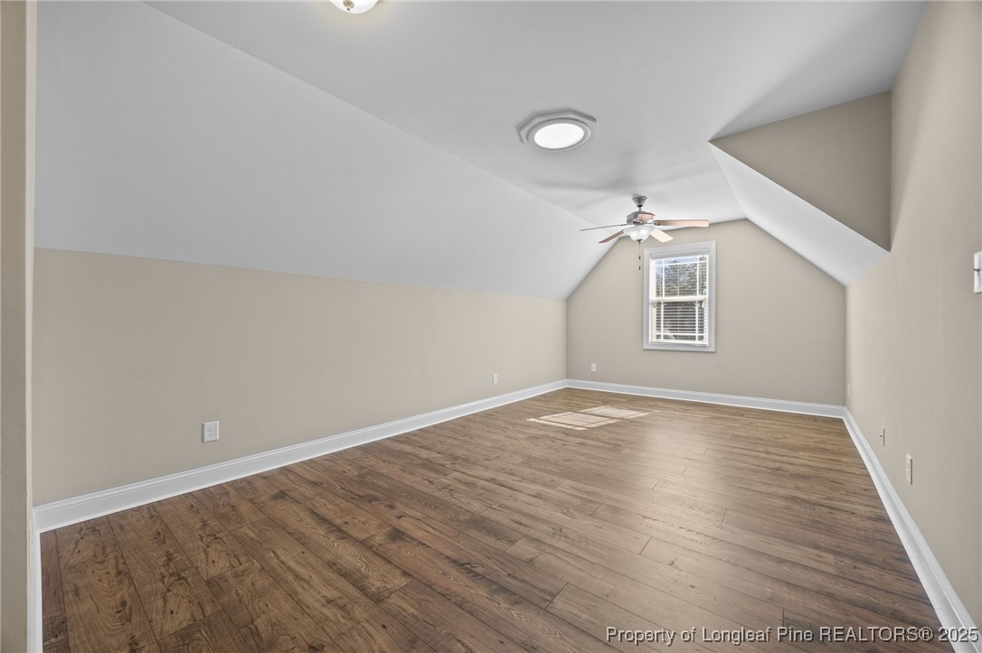 2904 Hampton Ridge Road Fayetteville, NC 28311 - Photo 38 of 50 an empty room with wooden floor and windows
