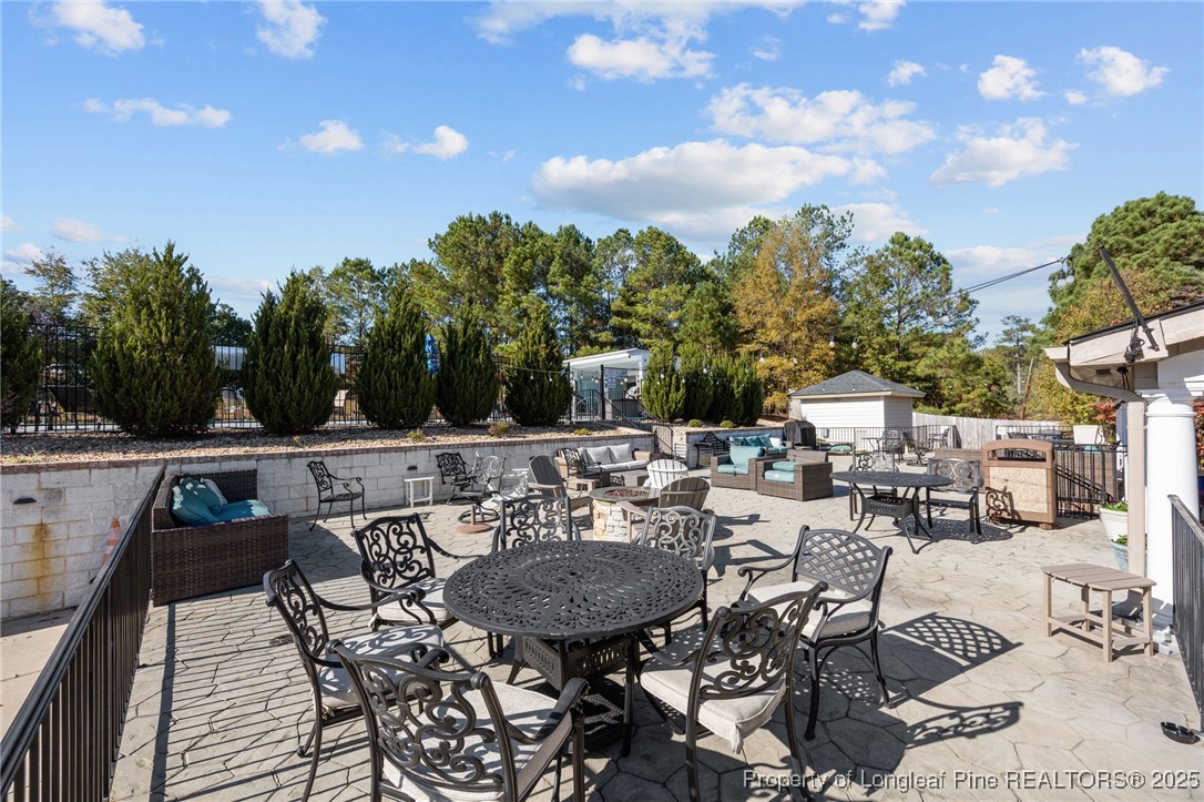 2904 Hampton Ridge Road Fayetteville, NC 28311 - Photo 45 of 50 a view of a chairs and table in patio