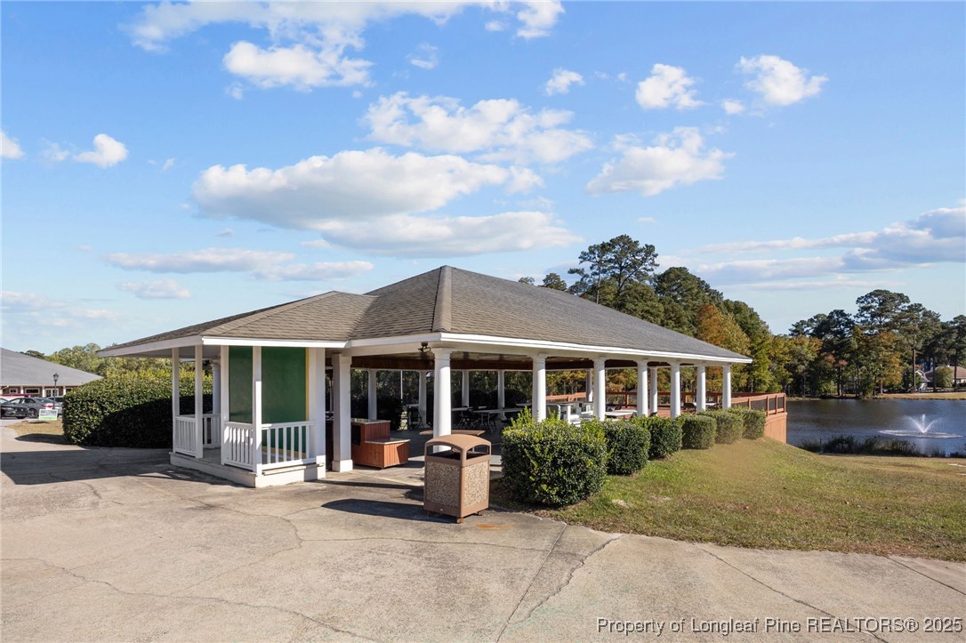 2904 Hampton Ridge Road Fayetteville, NC 28311 - Photo 47 of 50 a view of a house with backyard sitting area and garden