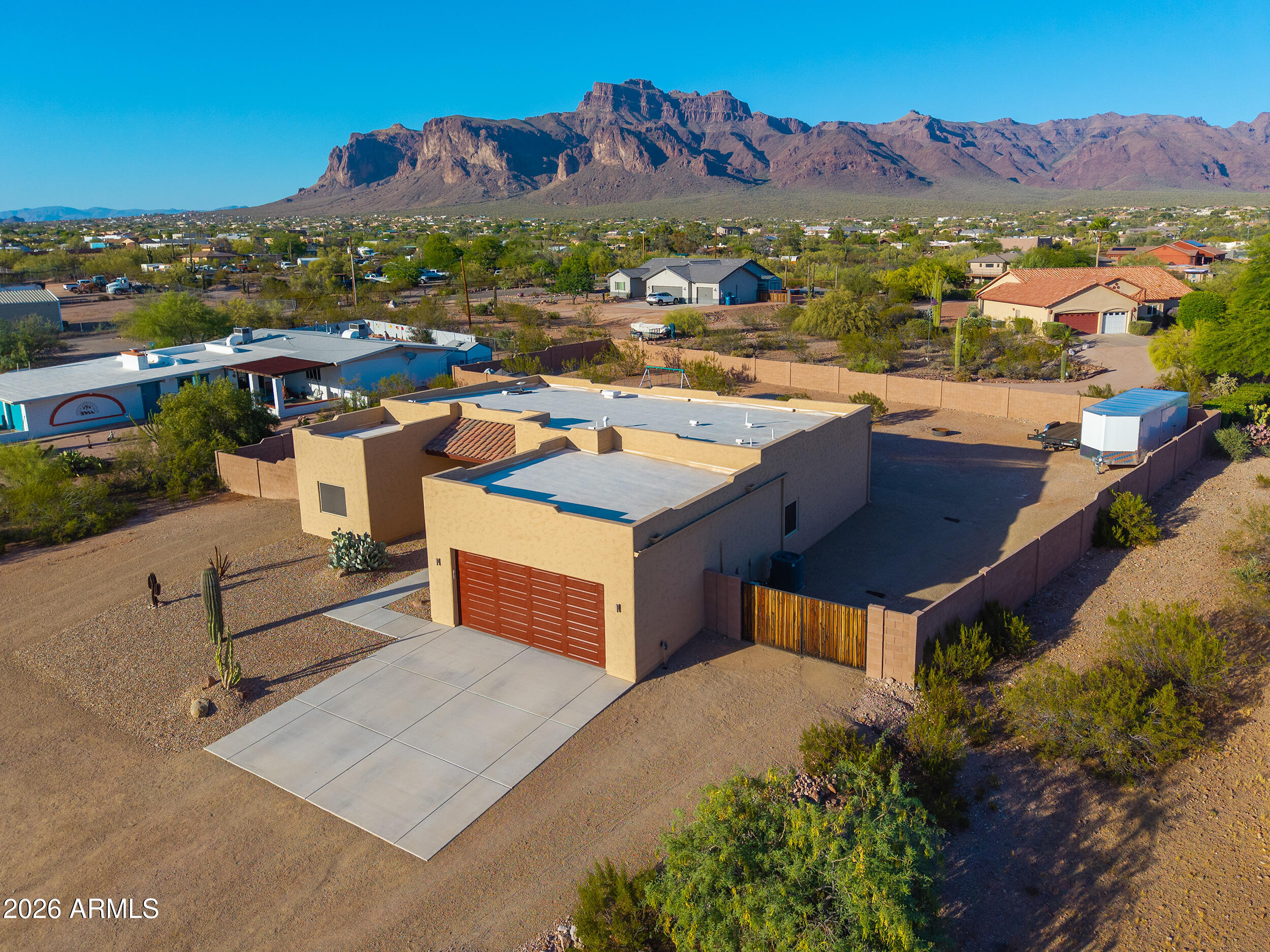 1487 South Mountain View Road Apache Junction, AZ 85119 - Photo 55 of 60 an aerial view of residential houses with outdoor space