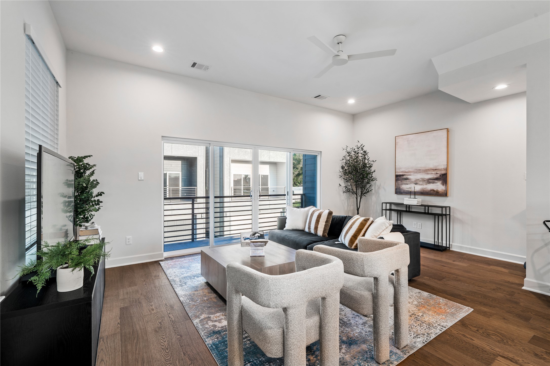 4708 Moving Meadows Houston, TX 77018 - Photo 12 of 40 Another angle showcasing warm tones in the living area with wide luxury vinyl that are scratch resistant and waterproof for low maintenance.