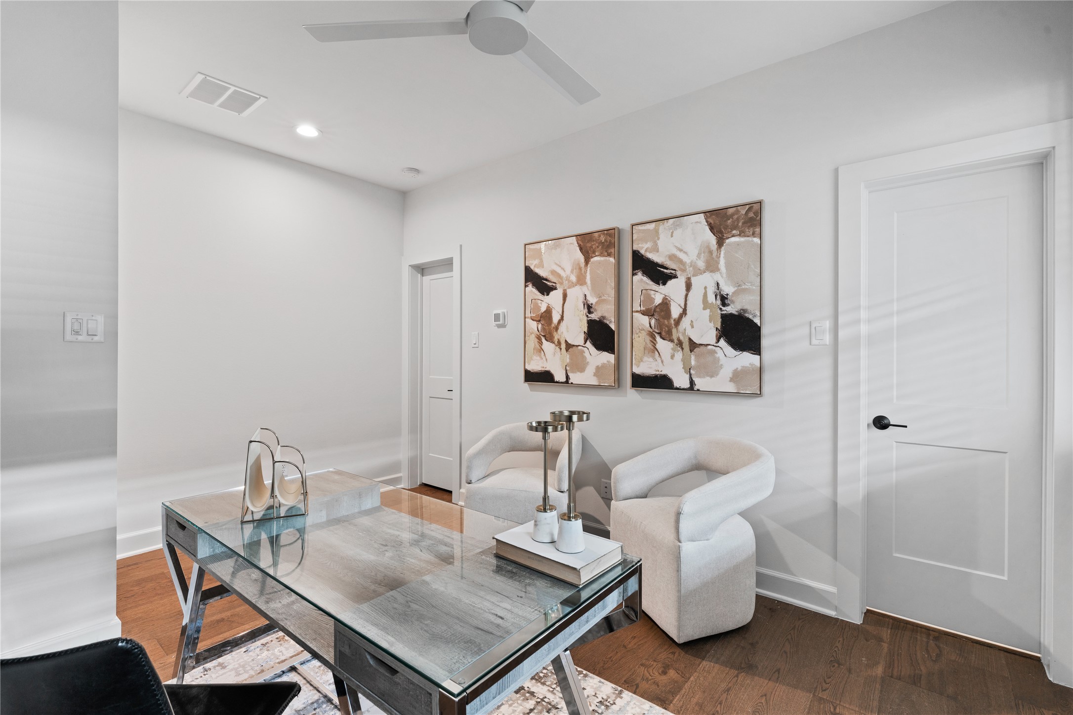 4708 Moving Meadows Houston, TX 77018 - Photo 7 of 40 Another view of the first floor office that has it's own private en-suite and walk in closet with warm tones and wide plank luxury vinyl floors.