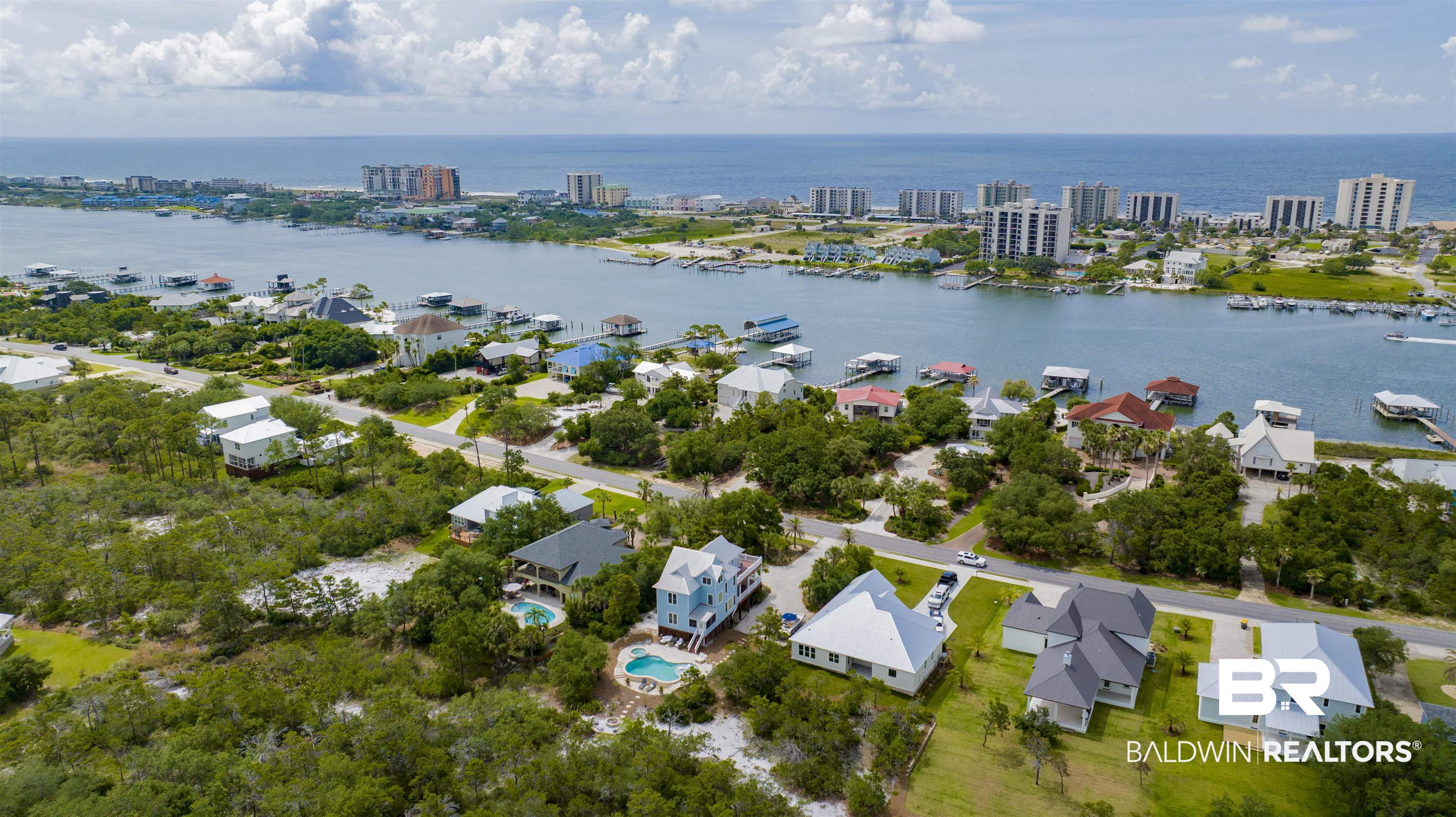 30351 River Road Orange Beach, AL 36561 - Photo 44 of 44 Aerial perspective showcasing a coastal community with multiple residential properties