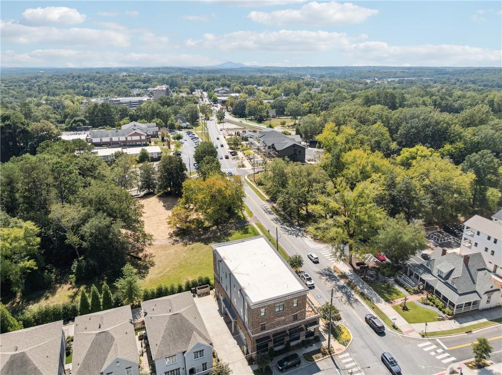 8255 Main Street, Unit 2 Woodstock, GA 30188 - Photo 38 of 46 an aerial view of a city with lots of residential buildings